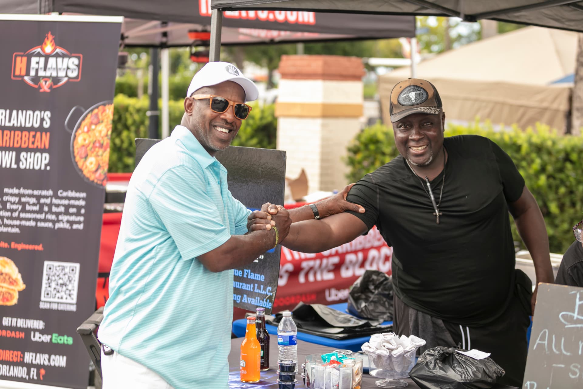 Two vendors shaking hands